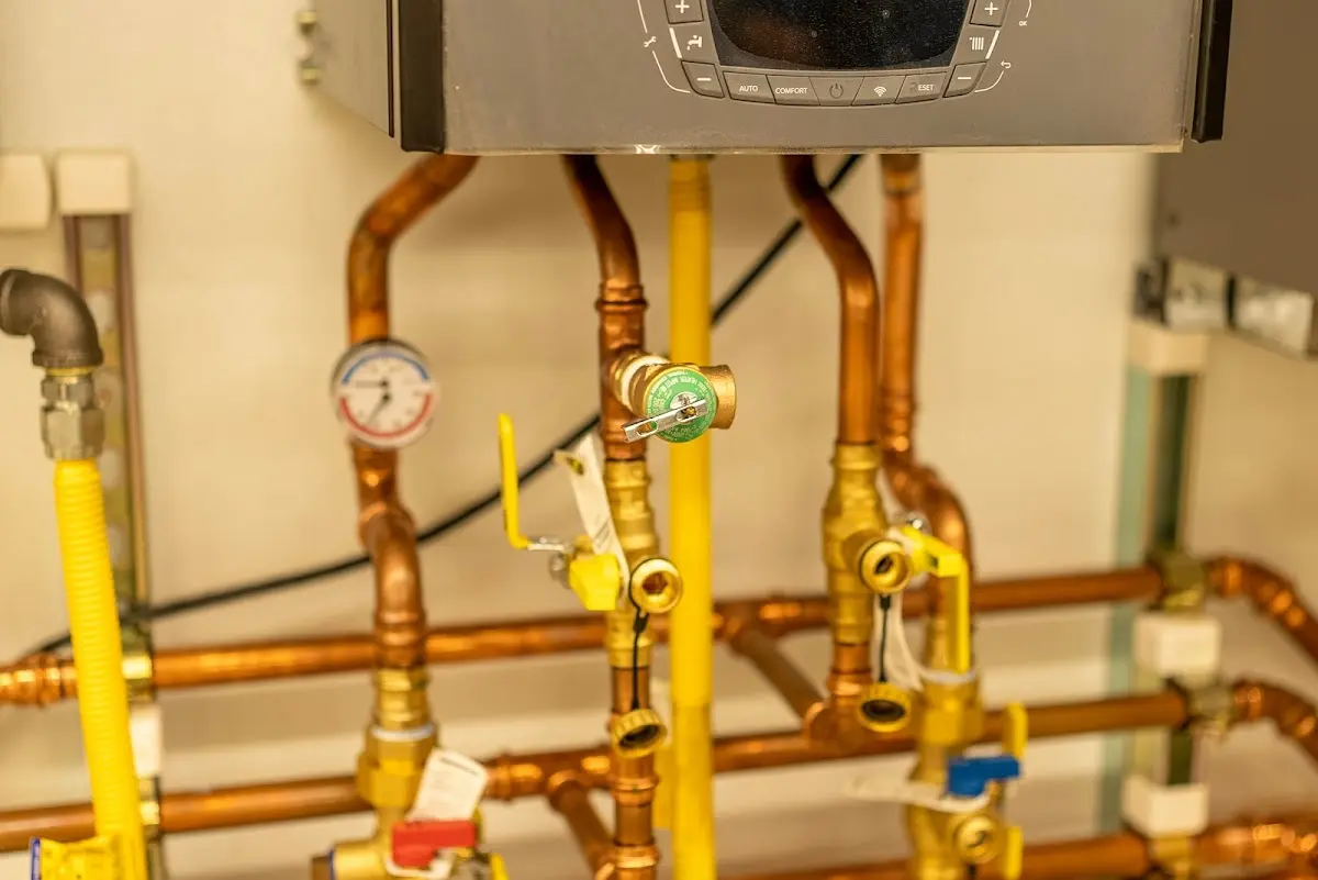 Licensed technician providing Emergency Plumbing for a homeowner in Wall